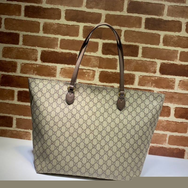 G*u*i shopping bags